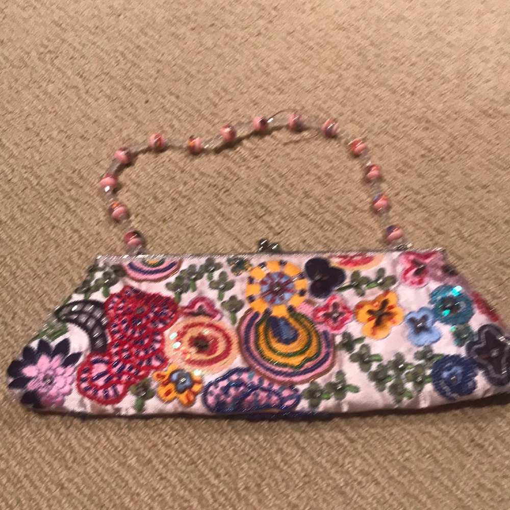 Embroidered clutch